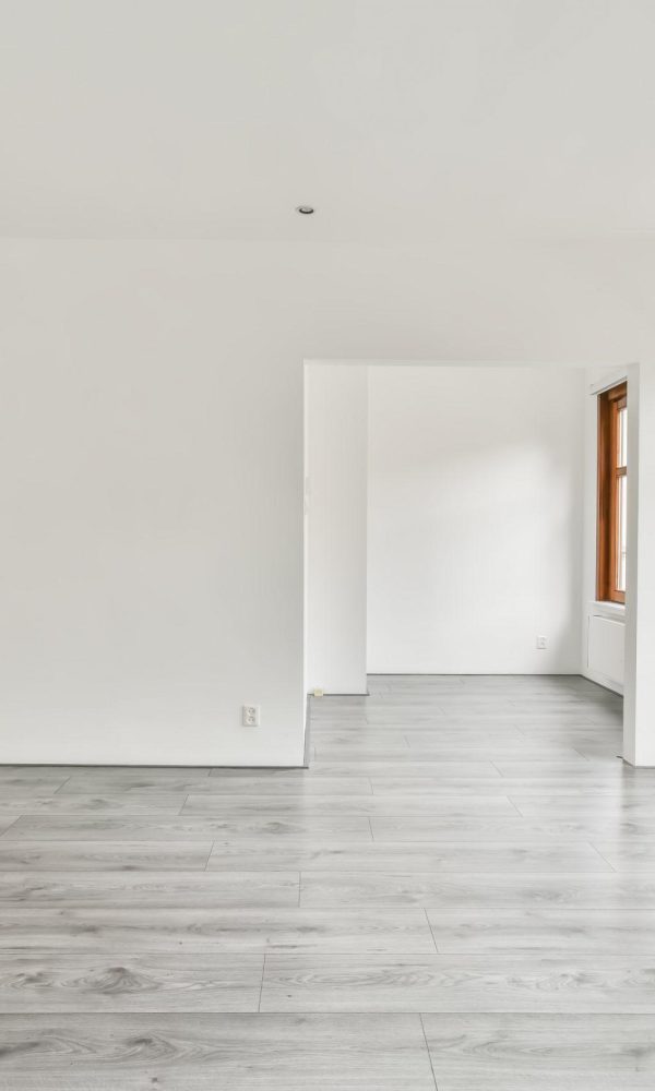 The interior of a white room with windows